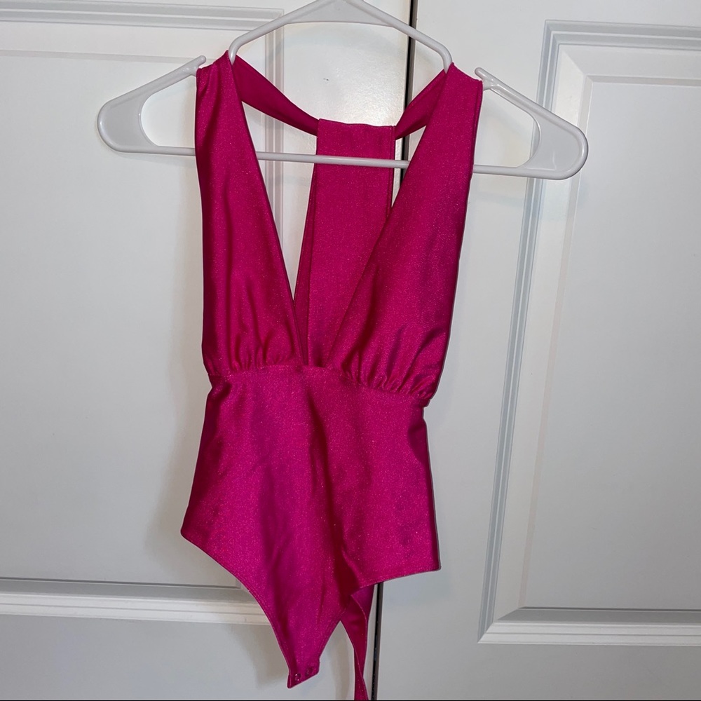 Hot pink body suit